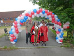 Mayor under ballooon arch